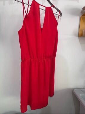 Red dress, gathered waist, hits mid thigh